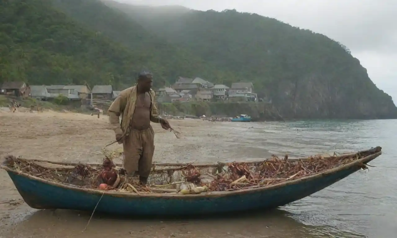 Local fishermen engaging in traditional practices while protecting marine ecosystems along a coastal village.